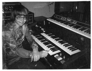 Steve Kuban Jr. as a teenage professional keyboardist, playing some of the musical equipment provided by his mother and father, Steve Kuban Sr.